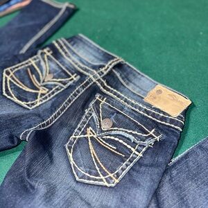 Silver Jeans Co. Distressed Bootcut Jeans